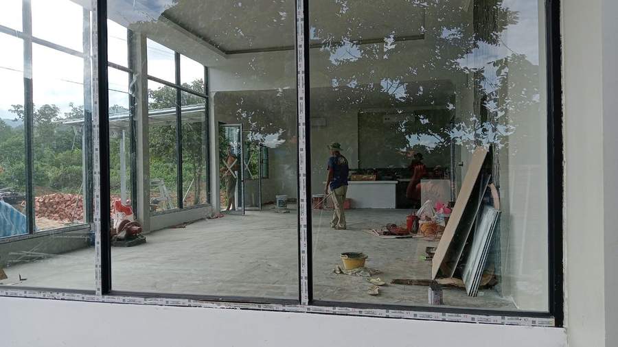 Modern building under construction with glass windows