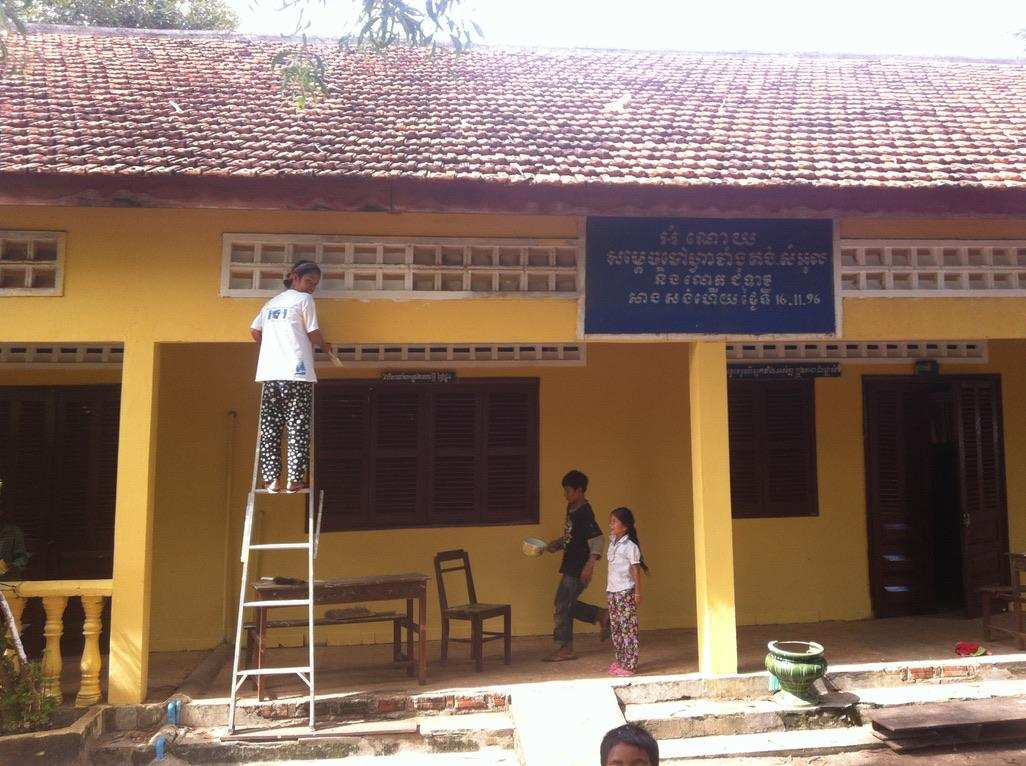 Painting the school exterior yellow
