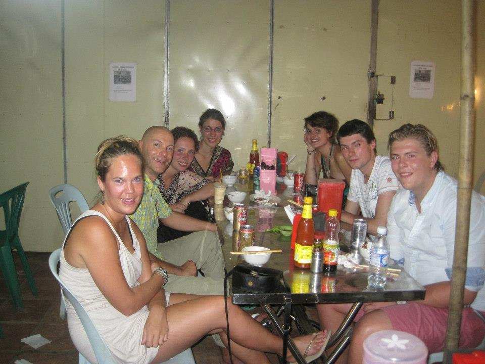 Volunteers sharing a meal together